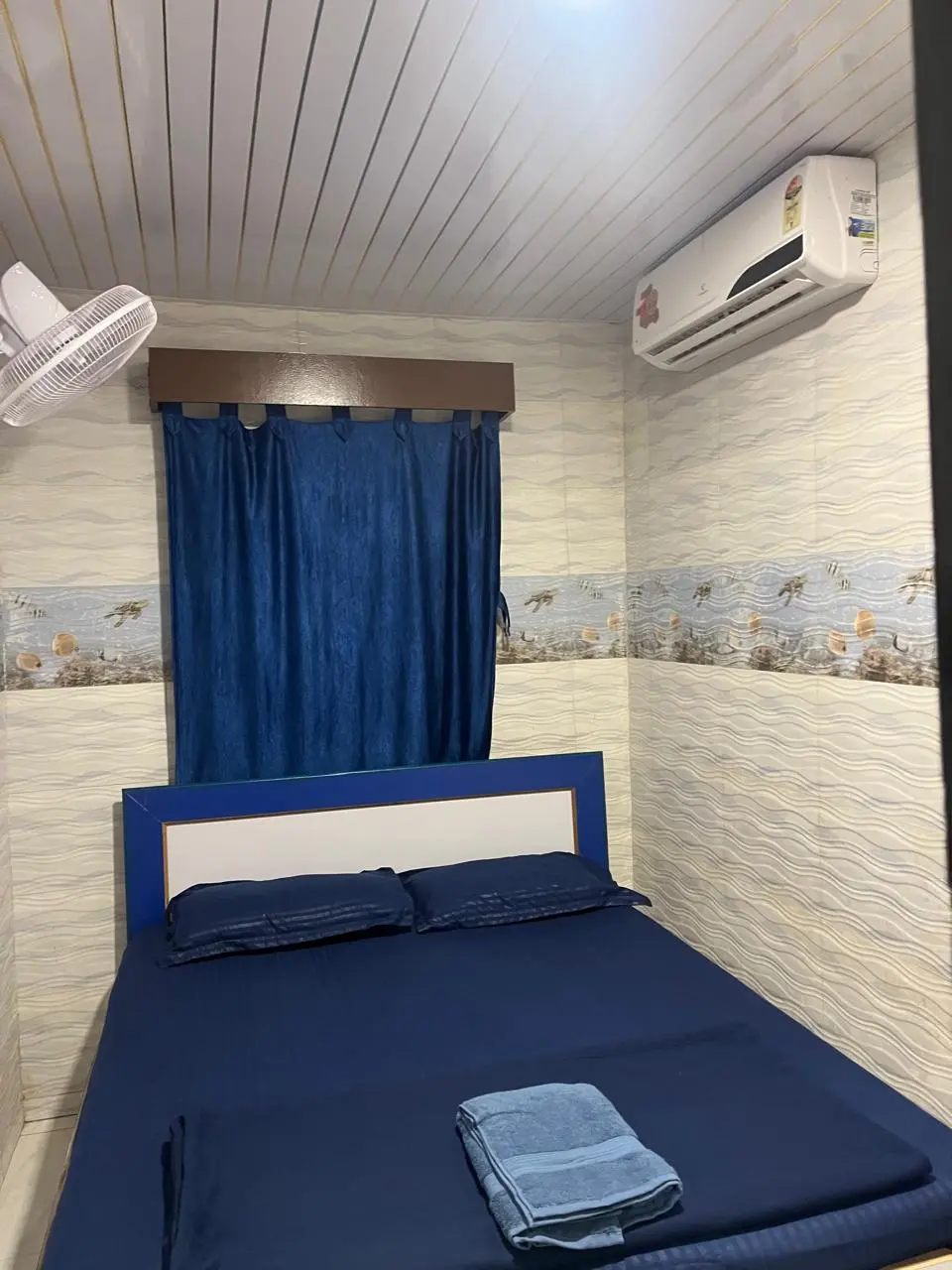 Comfortable room at Dolphin House Beach Resort used as a stay suggestion for users who move from Kashid travel research into Alibaug hotel comparisons